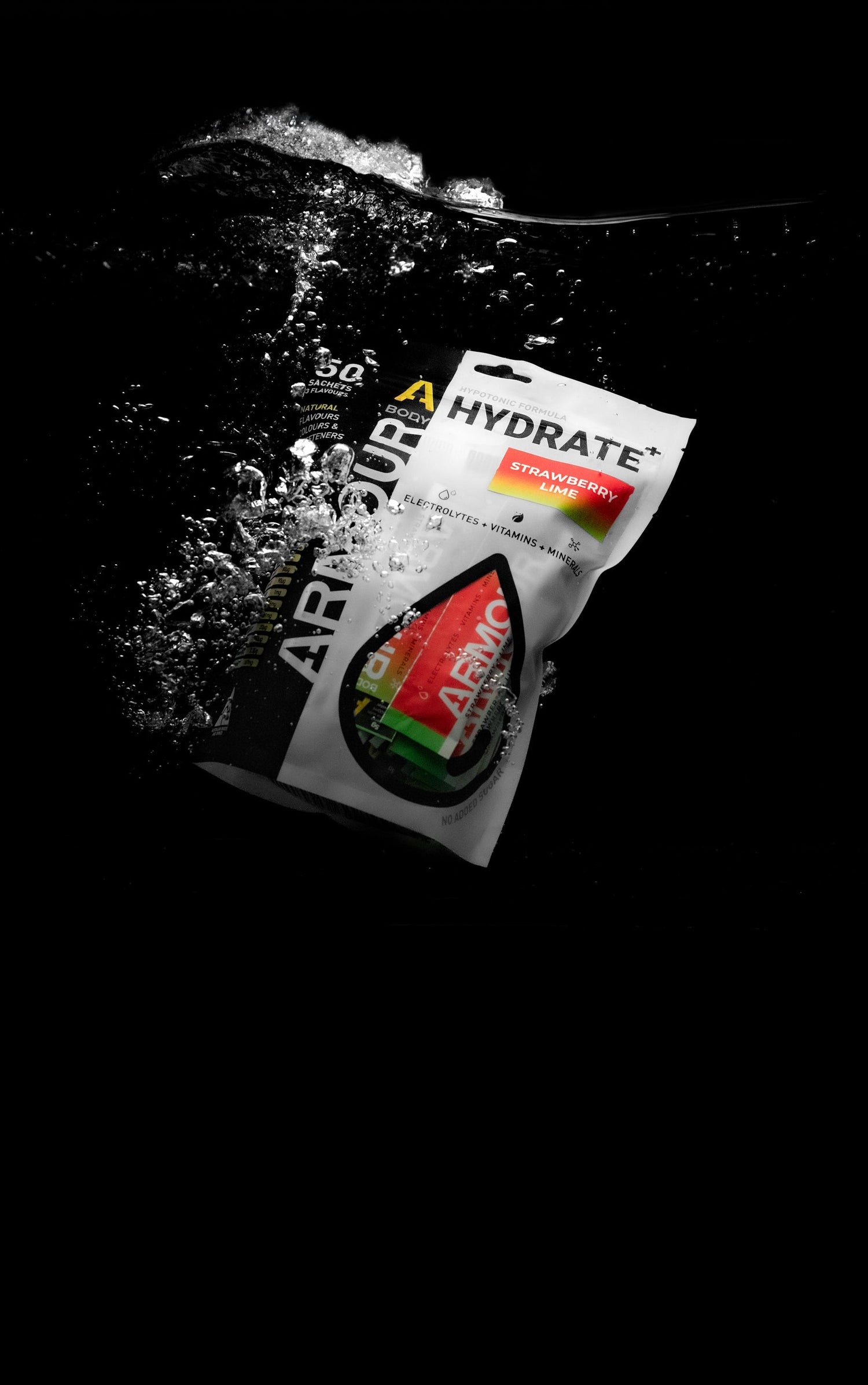Armour Hydrate sports drink package with water droplets on a black background